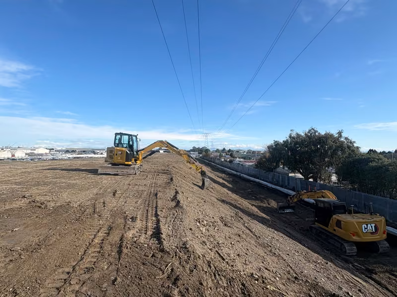Ground-level view of earthworks at Branston Street Bund