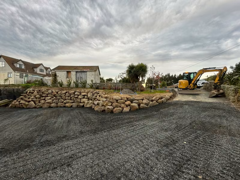 Residential site preparation with retaining and access earthworks